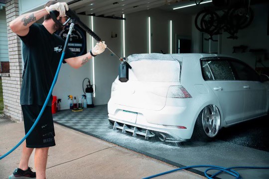 Cdubs spraying the back of a car.